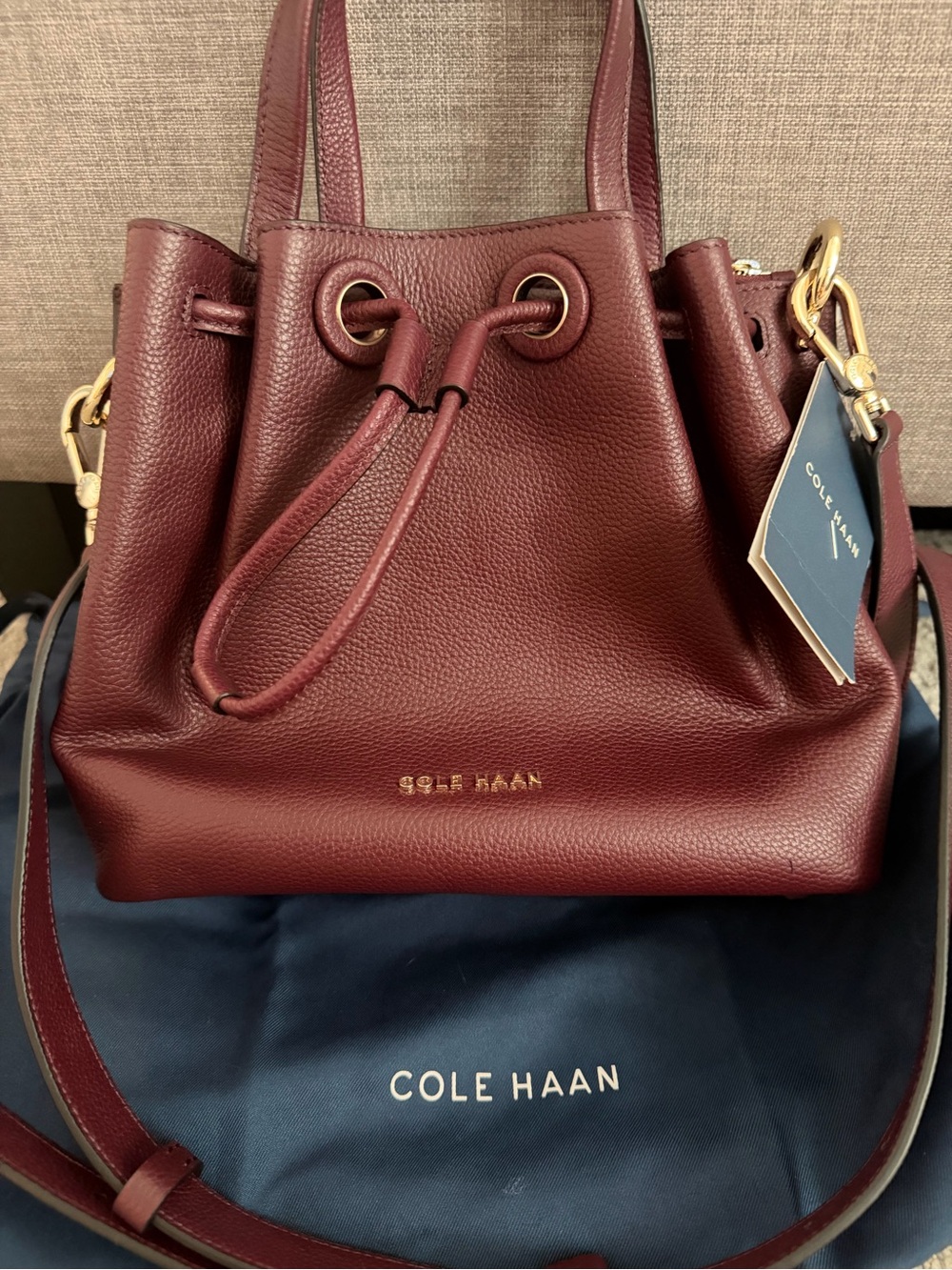 Cole Haan Burgundy Pebbled Leather Drawstring Bucket Bag with Gold Hardware